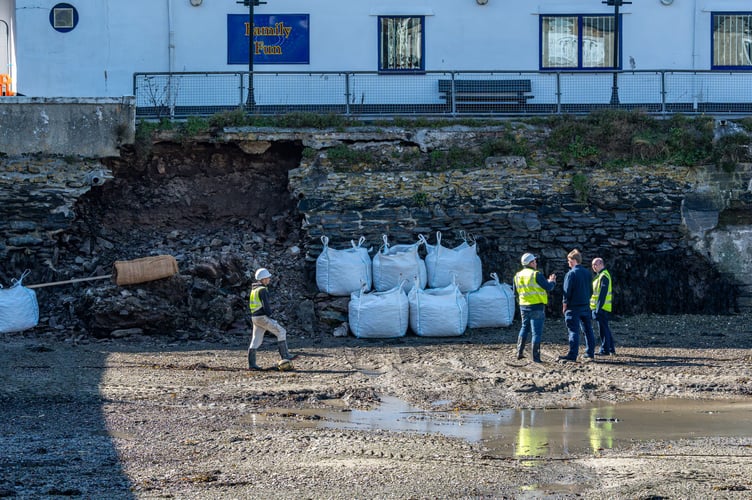 A local contractor has started work to shore up the harbour wall on the West Looe side of the river. (Picture: Chris Kennedy/Photonaut)