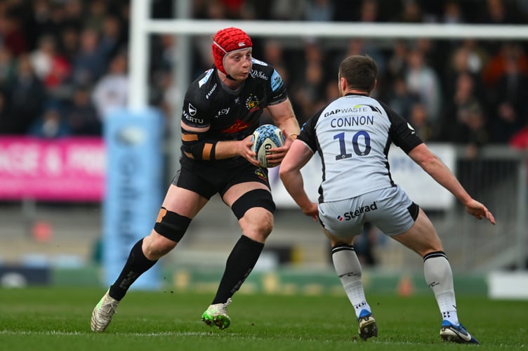 Exeter Chiefs flanker Martin Moloney looks to find a way past Newcastle Falcons fly-half Brett Connon