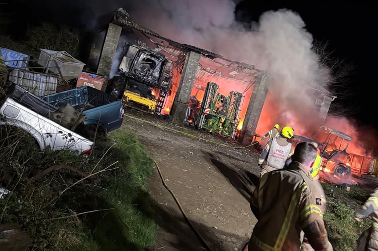 Firefighters deal with the blaze at a farm building at Blunts in the early hours of Sunday morning