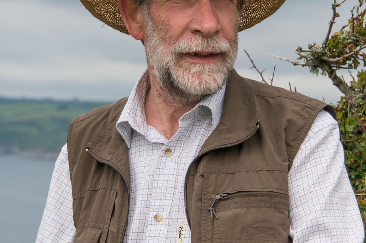 Author Tom Michell photographed at Hemmick Beach