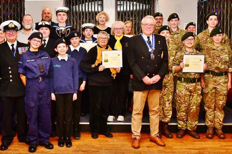 Torpoint and Rame Peninsula Royal British Legion chairman, Colin Prideaux hands over Certificates of Appreciation to clubs, groups and organisations who have given their time and energy in support of the RBL Poppy Appeal 