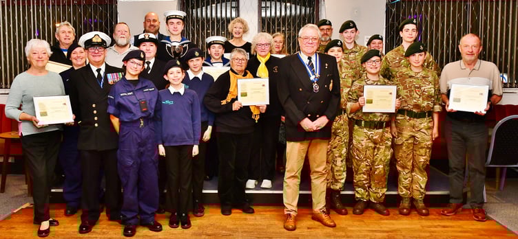 Torpoint and Rame Peninsula Royal British Legion chairman, Colin Prideaux hands over Certificates of Appreciation to clubs, groups and organisations who have given their time and energy in support of the RBL Poppy Appeal