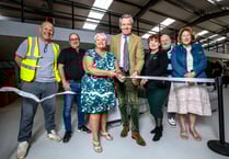Recycling warehouse celebrates reopening