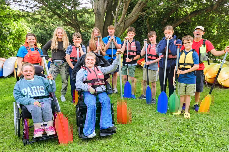 Youngsters from the Active8's Acceler8 group enjoy a canoeing session in Bude
