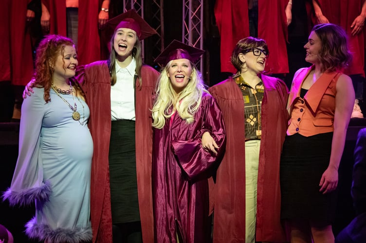"We did it!" Alice Waterfield (Paulette Buonufonte), Vienna Bate (Vivienne Kensington), Jess Madeley (Elle Woods), Bex Rogers (Enid Hoopes) and Zoe Hilditch (Brooke Wyndham) show us what true girl-power means