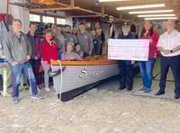 Swim in harbour raises hundreds of pounds for charity