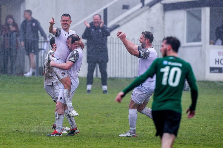 St Austell's Neil Slateford celebrates his free-kick that sealed the 2-0 victory over St Blazey