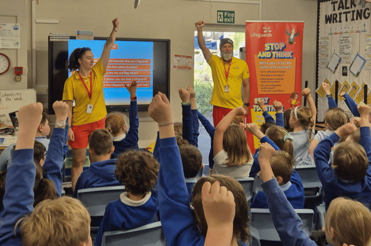 Children from St Nicholas C of E Primary School in Downderry get to learn from RNLI lifeguards about safety at sea