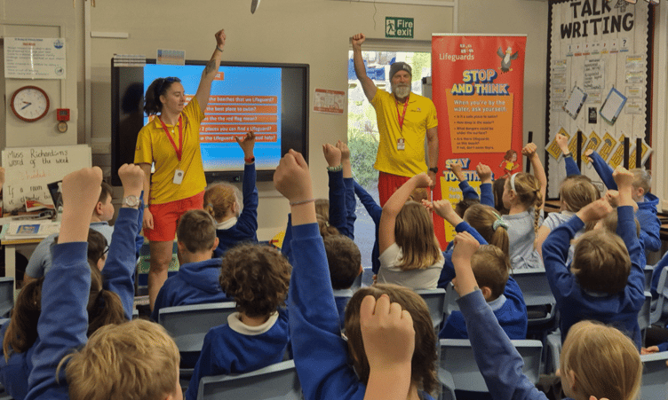 Children from St Nicholas C of E Primary School in Downderry get to learn from RNLI lifeguards about safety at sea