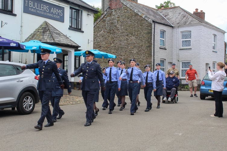 Members of the Saltash Air Corps march in Landrake as part fo the VE Day 80 Celebrations