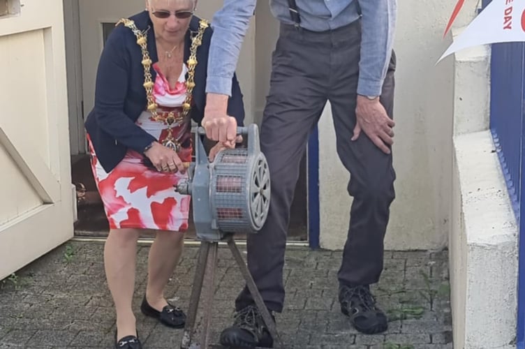 Liskeard Town Mayor Christina Whitty and Brian Olding sound the air raid siren