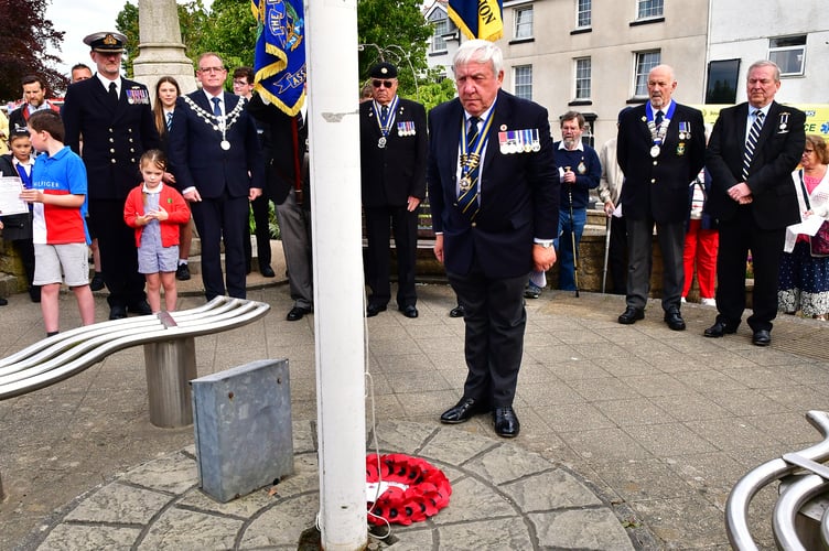 Crowds gathered for the wreath-laying and raising of the VE Day 80 flag in Torpoint. Picture Andy Campfield