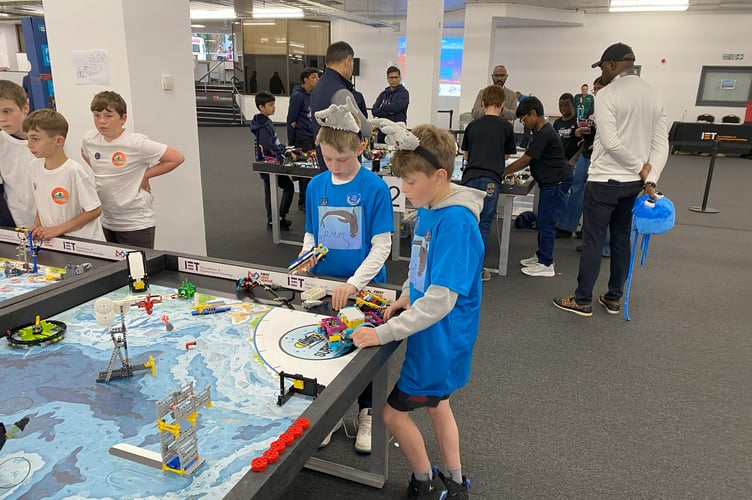 Youngsters from Darite Primary Academy hard at work impressing the judges at the first LEGO League National Finals in Harrogate