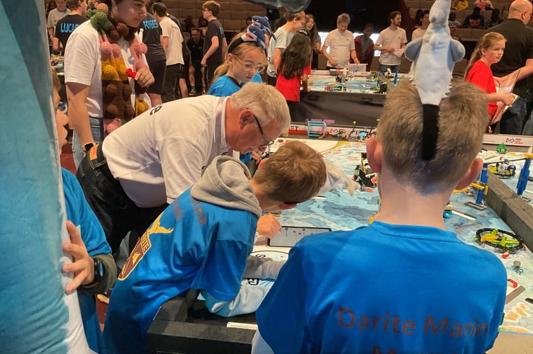 Youngsters from Darite Primary Academy hard at work impressing the judges at the first LEGO League National Finals in Harrogate