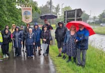 Hearty souls brave the rain for Beating of the Bounds event