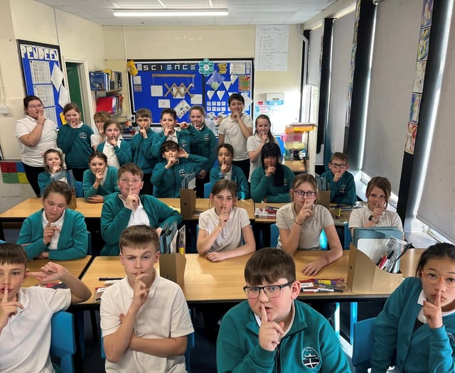 Pupils raise funds for disaster relief with sponsored silence