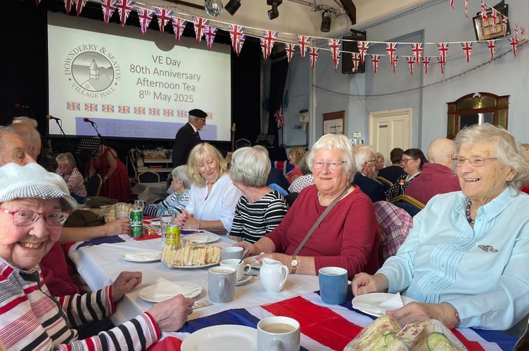 Residents joined together in Downderry and Seaton Village Hall for a VE Day 80th anniversary afternoon tea