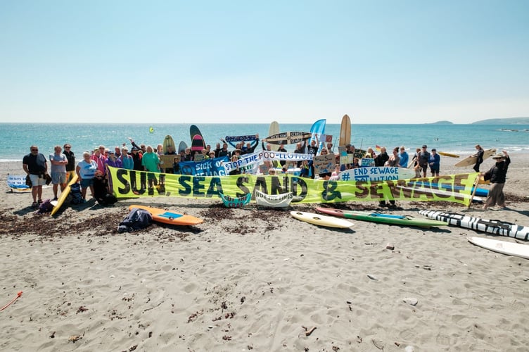 Protestors gather at Seaton Beach to hit out at the amount of unchecked raw sewage being put into coastal waters