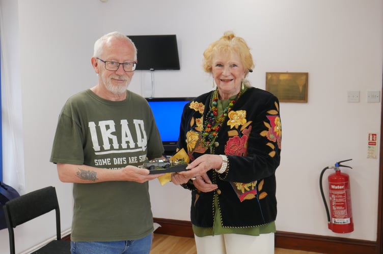 Charity build winner Jim Thompson alongside Sue Hooper, chair of the Sue Hooper Charitable Foundation.