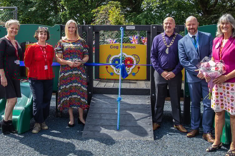 Pictured (left to right): Elizabeth Christmas-Hutton (Kicks Count CEO), Maud Riviere (Sistema Regional Marketing Lead), Mayor of Saltash Cllr Rachel Bullock and her consort Matthew Bullock, Darren Woolner (Head Teacher Brunel Primary & Nursery Academy) and Ali Humphreys (from the Recycling for Charity Project) at the ribbon cutting event proudly posing in front of the schools contest winning prize, a brand-new playground with a frame made of 100% recycled materials.