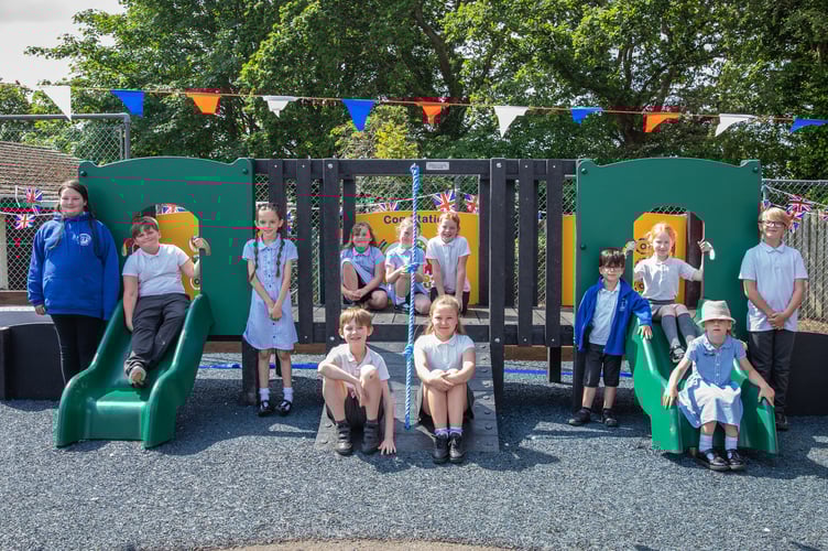 Pupils from Brunel Primary and Nursery Academy are all smiles following the arrival of their new playground.
