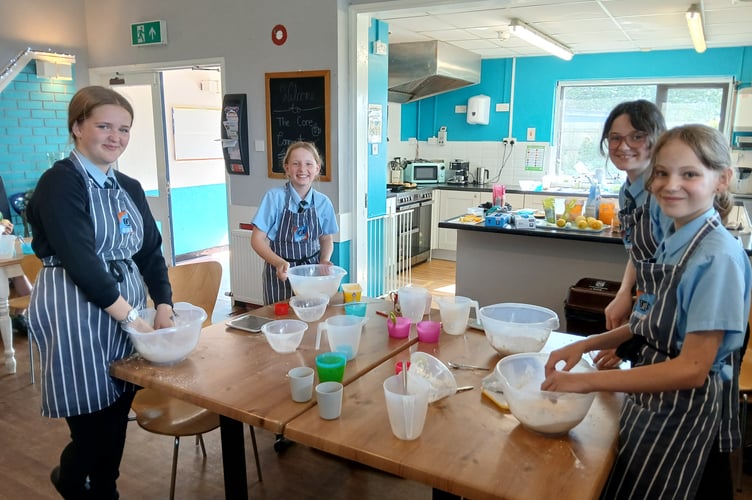 Youngsters enjoying the chance to learn some cookery skills at the Core Youth and Community Centre in Saltash.
