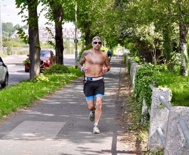 Marathon man continues to pound local streets in aid of charity