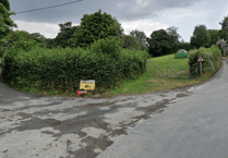 Pair rescued from overturned vehicle on narrow country road