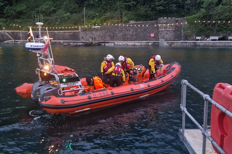 The Looe RNLI Atlantic 85 Sheila and Dennis Tongue II at the landing pontoon after dropping off the casualties 