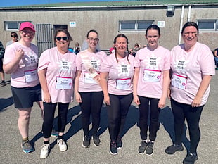 Staff get pretty muddy and play football in aid of good causes
