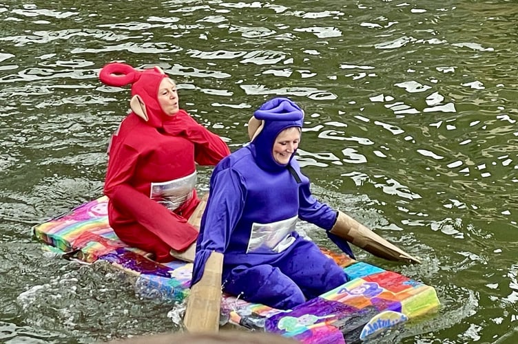 Saltash town mayor, Cllr Rachel Bullock (right) and former mayor, Cllr Julia Peggs, take part in the Cardboard Boat Race