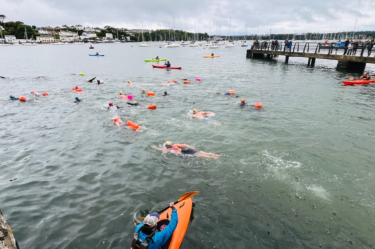 Swimmers take to the River Tamar as part of the wild swim held at Saltash Regatta