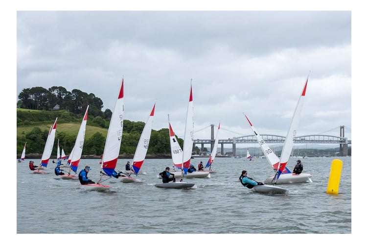The famous Brunel and Tamar bridges formed the backdrop of the racing hosted by Saltash Sailing Club for the Topper Southwest Traveller Series. (Picture: Will Lee)