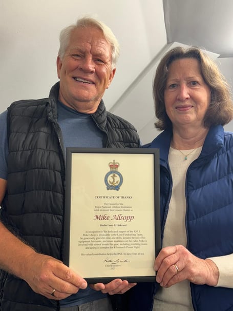 Mike Allsopp from Liskeard Looe Radio is presented with his Certificate of Thanks from the RNLI