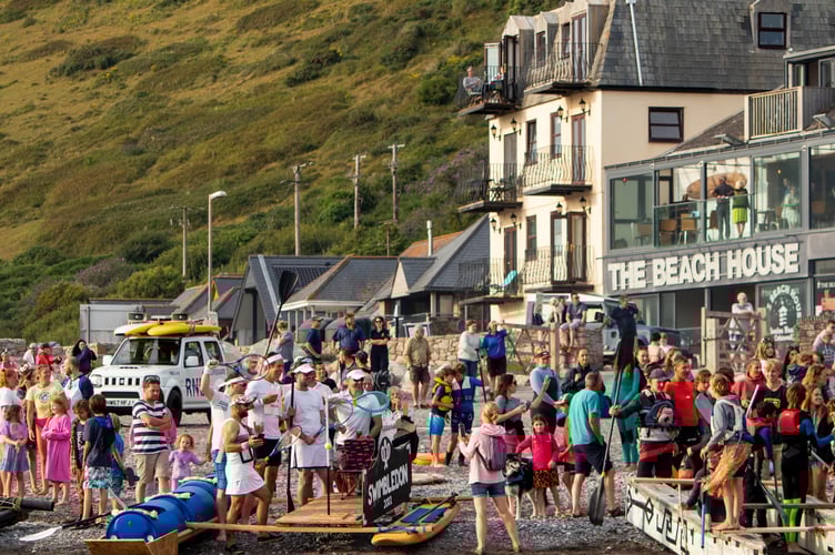Crews line-up ahead of the annual South East Cornwall Surf Club raft race between Seaton and Downderry