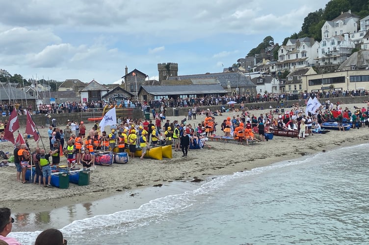 The calm before the storm...all the rafts line up ahead of the annual Looe Raft Race