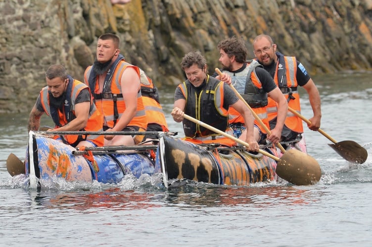 All the Way from Calais crew in full flow during the annual Looe Raft Race. Picture: (Jon Harris Photography)