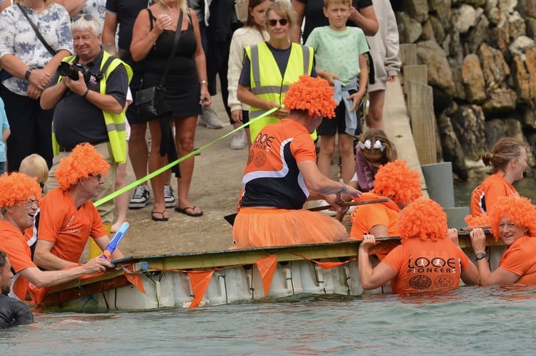 Members of the Looe Pioneers do their best to navigate their way along the race course