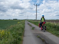 Researcher connects with farmers during 2,000-mile cycle challenge