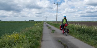 Researcher connects with farmers during 2,000-mile cycle challenge