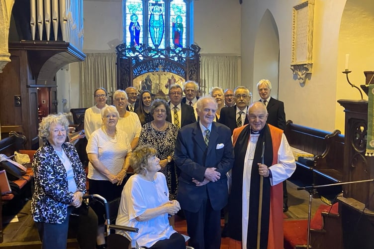 The choir from all five parishes with organist Eric Distin and The Rt Revd David Williams, Bishop of Truro