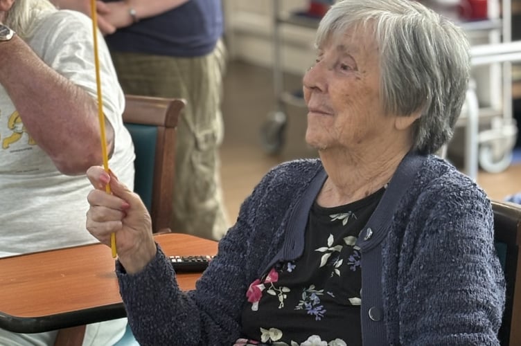 Residents at Chyvarhas Residential and Nursing Home in Callington enjoying a spot of plate spinning