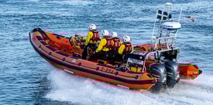 RNLI volunteers rescue trio in sinking kayak