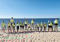 Club celebrates after hosting surf life saving contest