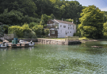 Riverfront estate with rock history and private studio up for sale