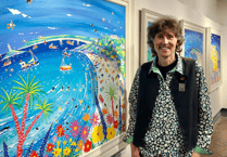 Renowned artist produces product range that celebrates popular event in Fowey