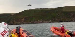 Dramatic coast rescue saves two people and dog from rising tide