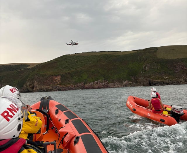Dramatic coast rescue saves two people and dog from rising tide