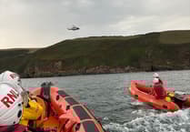 Dramatic coast rescue saves two people and dog from rising tide