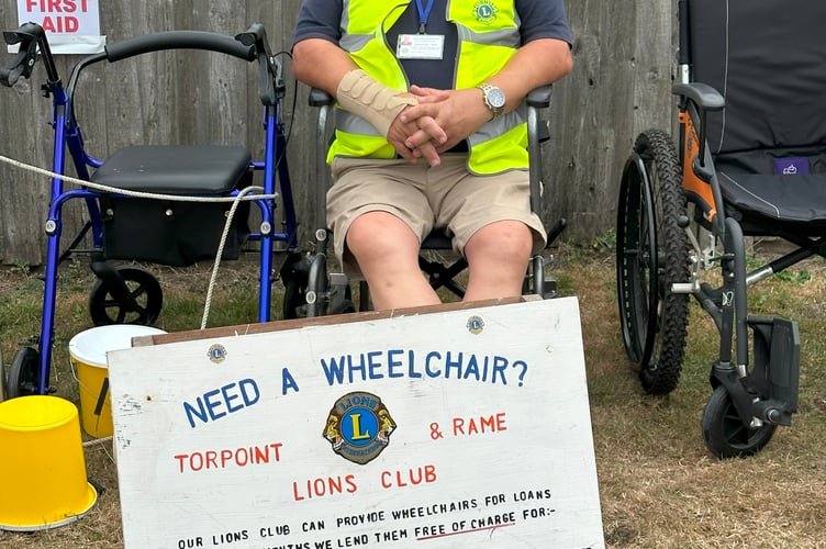 Lion Graham Evans at the Lions Summer Fair promoting the 'Wheelchair Loan' scheme